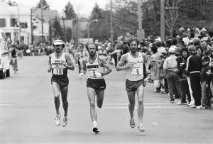 Black and white image of Paul Cummings running
